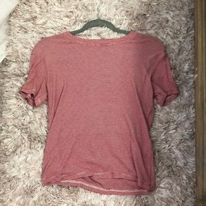 Red and white stripped t shirt.